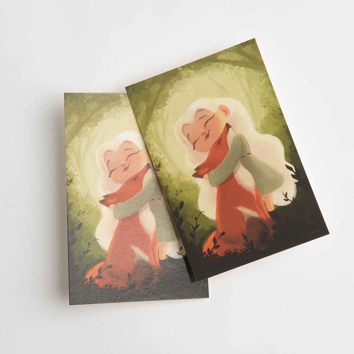 Two postcards printed with custom artwork and finished with Soft Touch laminate.